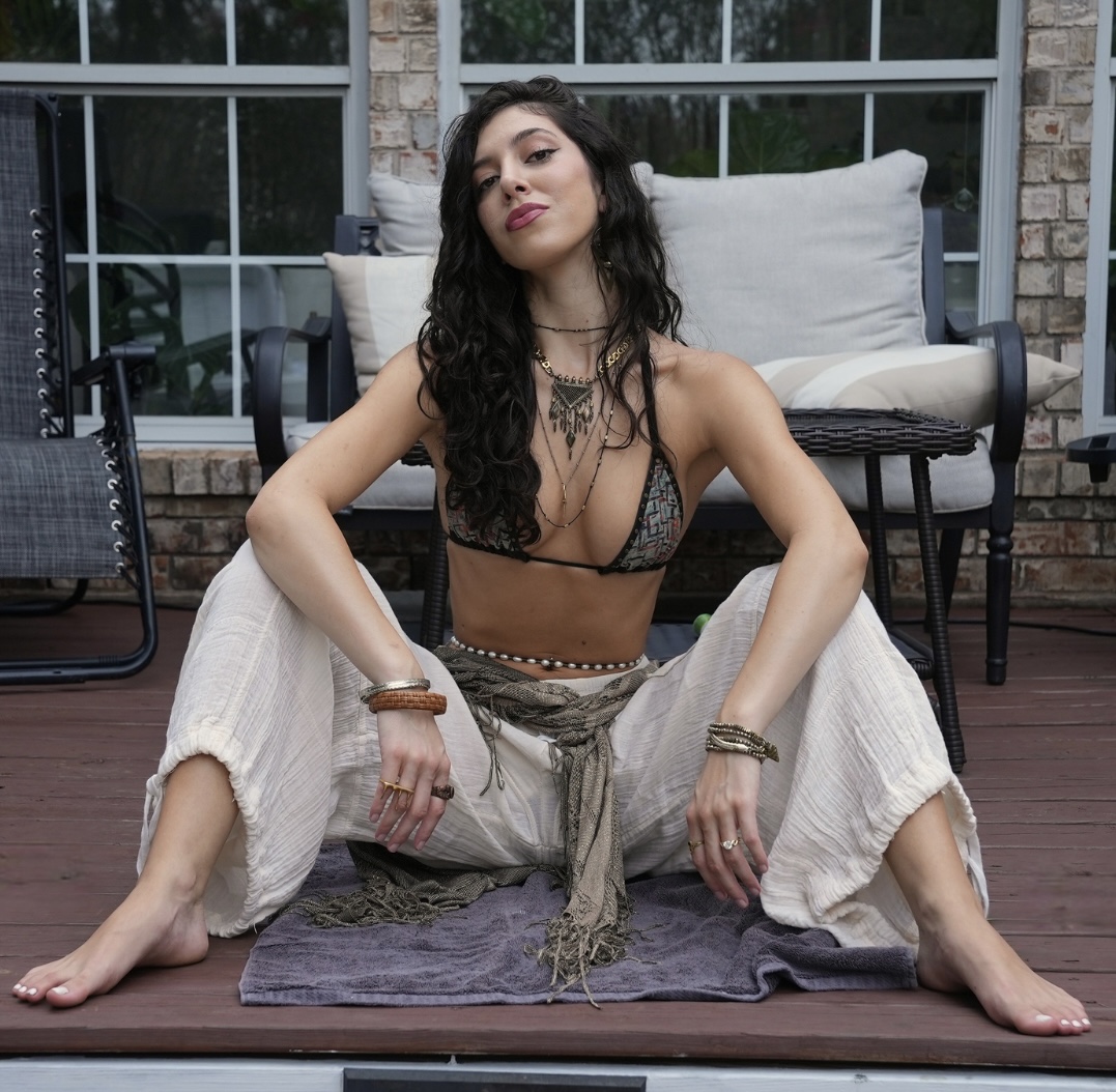 Zoë Dane seated in ritual attire